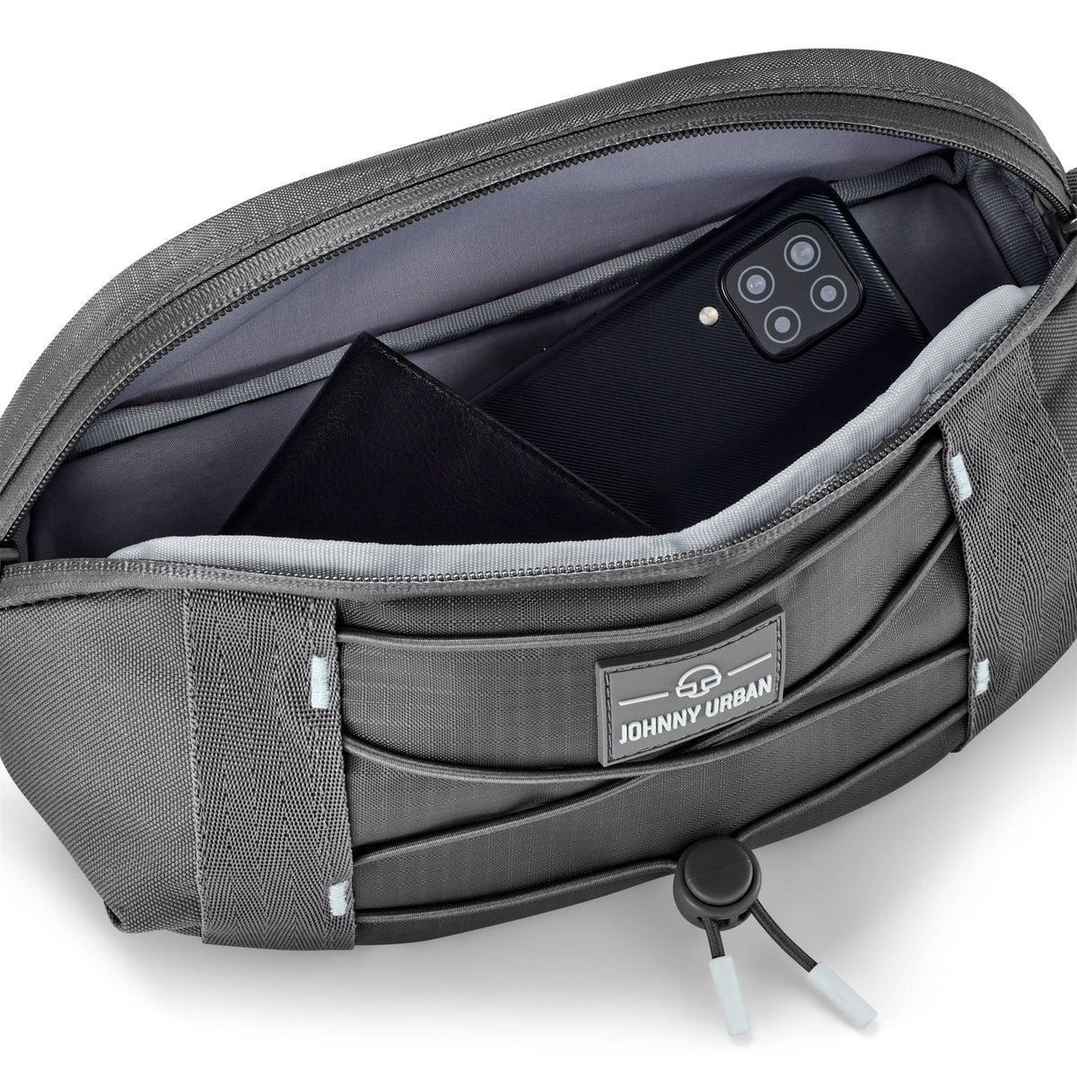 Graue Bauchtasche ‚Devin‘ von Johnny Urban mit geöffnetem Hauptfach, darin Smartphone und Geldbörse