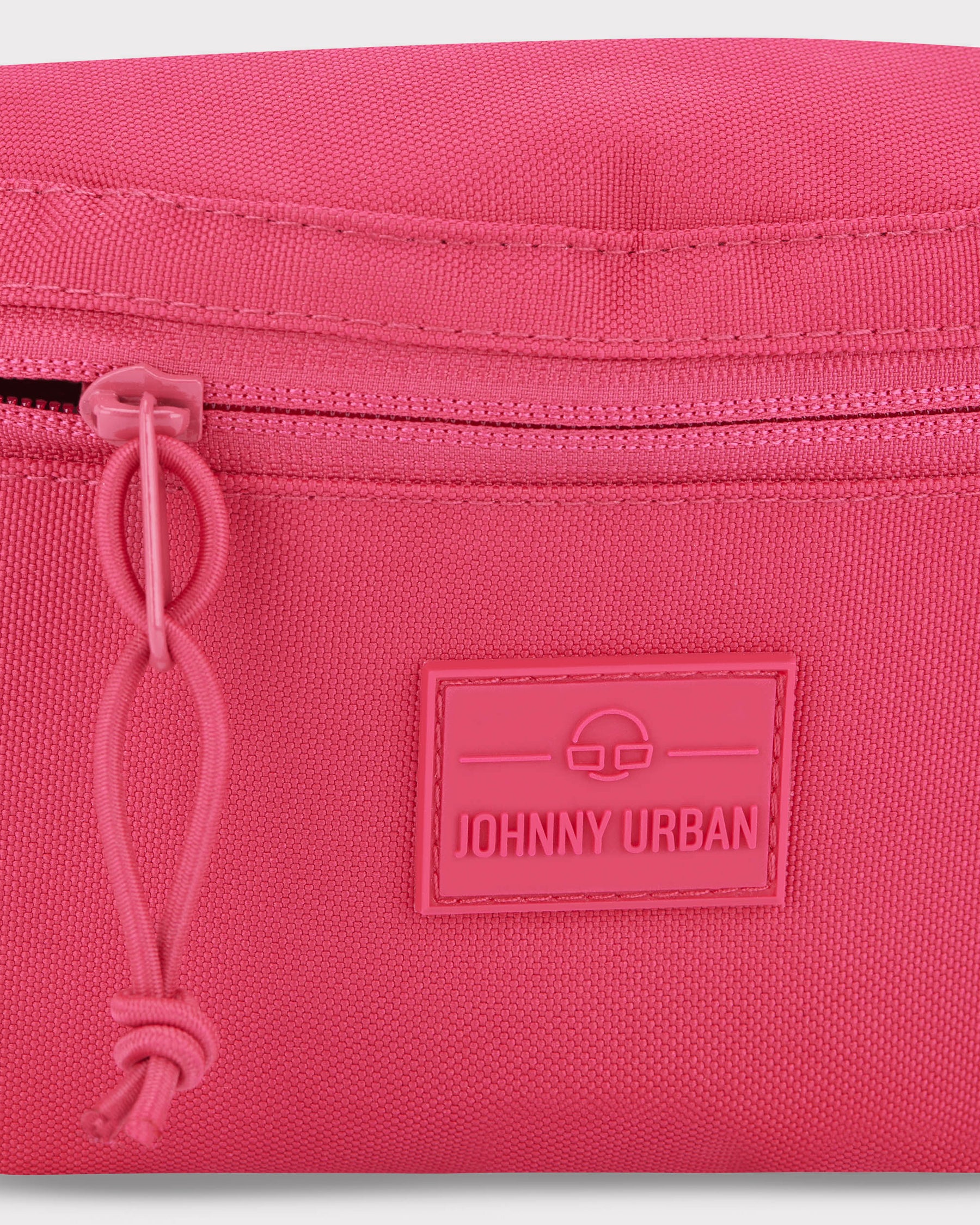 Rosa Bauchtasche 'Erik Small' von Johnny Urban aus robustem Material mit Reißverschluss und markantem Logo