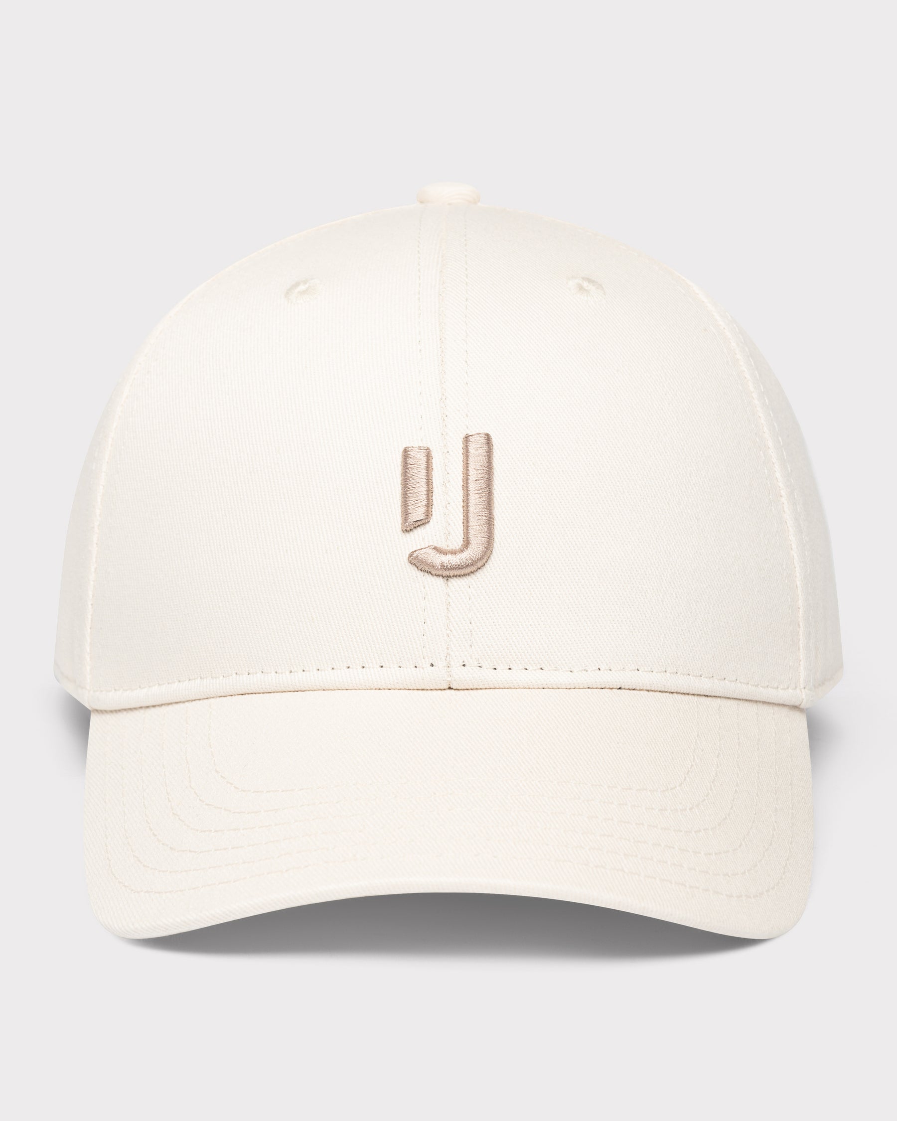 Cremefarbene Cap ‚Jason‘ mit beigem, gesticktem Johnny Urban Logo