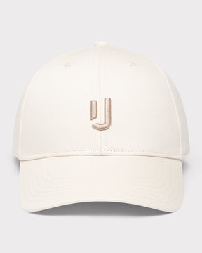 Cremefarbene Cap ‚Jason‘ mit beigem, gesticktem Johnny Urban Logo