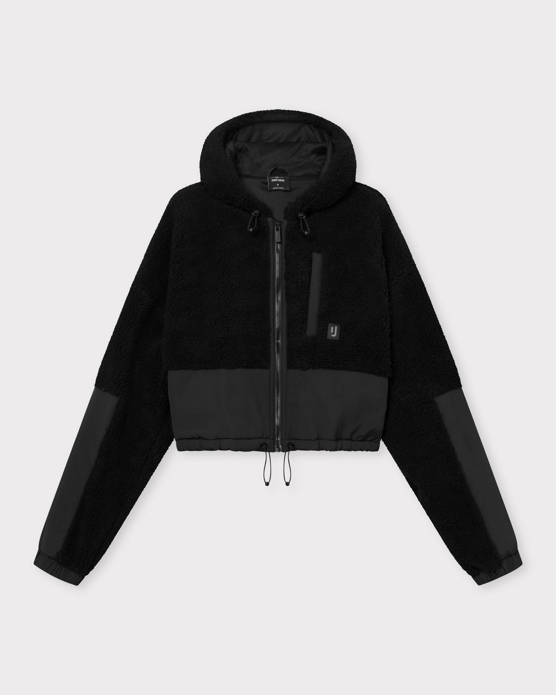 Schwarze, kurz geschnittene Teddy-Fleecejacke 'Carey' mit Reißverschluss, Kapuze und elastischem Saum