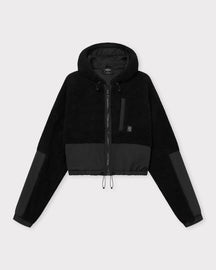 Schwarze, kurz geschnittene Teddy-Fleecejacke 'Carey' mit Reißverschluss, Kapuze und elastischem Saum