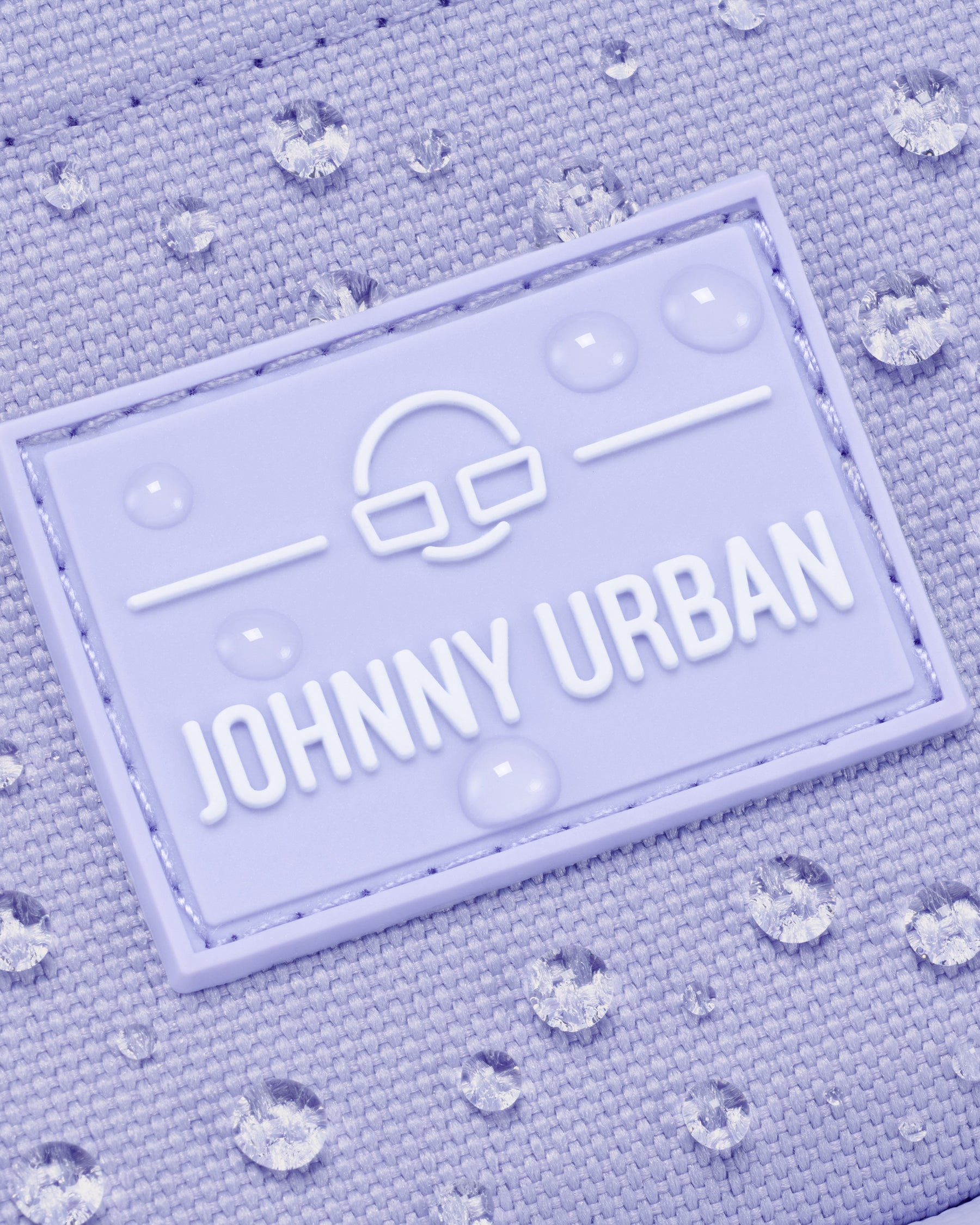 Wasserabweisendes Gewebe des Front Packs 'Arthur' mit Johnny Urban Logo und Wassertropfen