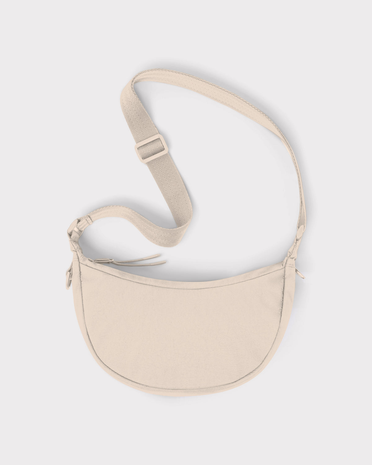Sandfarbene Half Moon Bag "Kaia Small" mit verstellbarem Schulterriemen aus robustem Textil