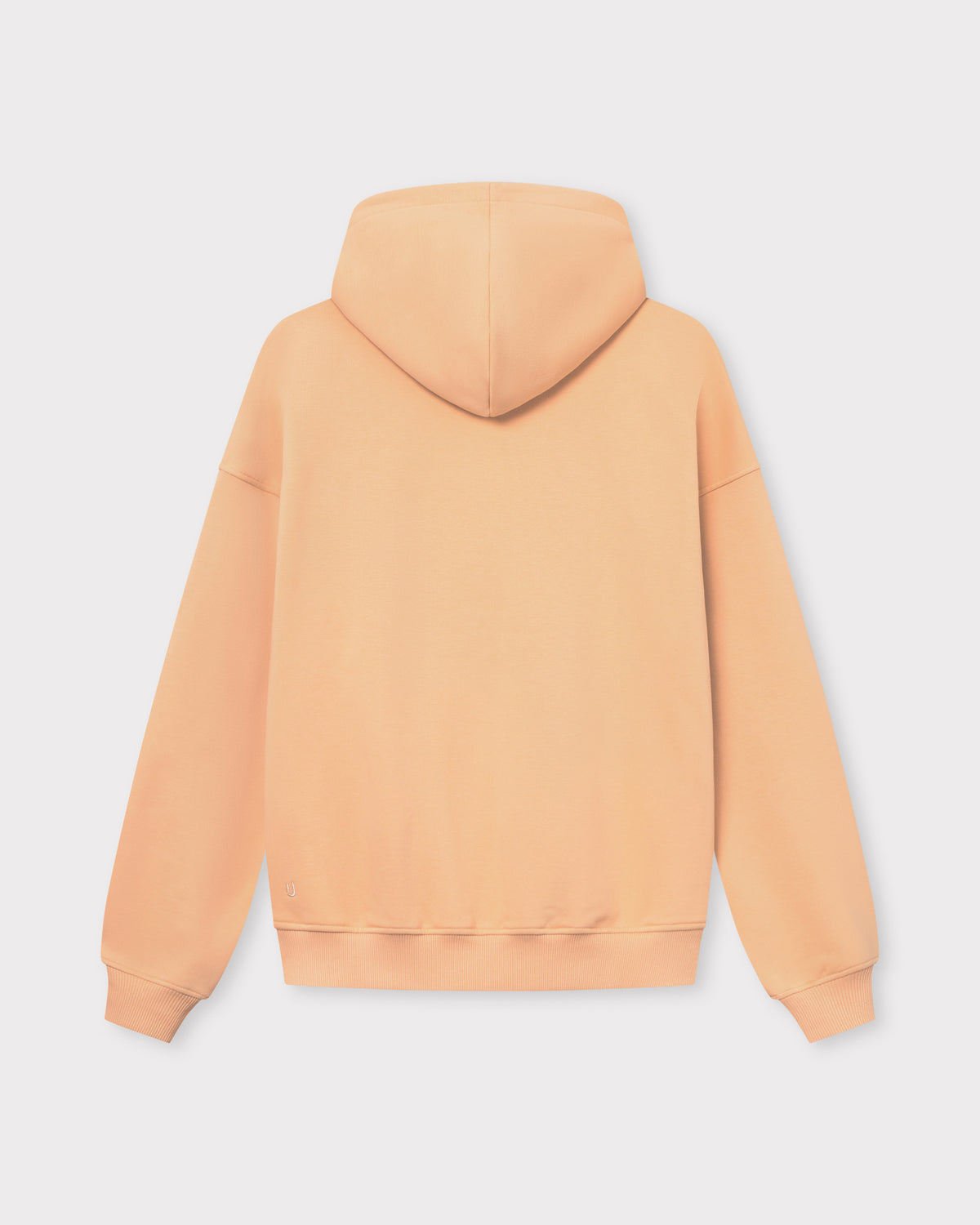 Oversized Hoodie 'Cody' in Pfirsichfarbe mit Kapuze, Rückseite sichtbar, gerippte Bündchen und Saum
