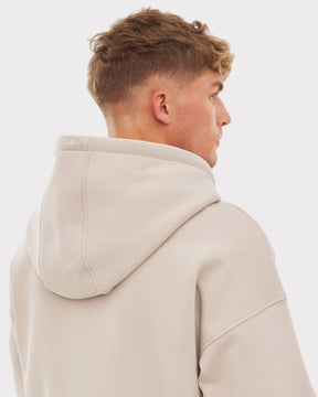 Beiger oversized Kapuzenpullover 'Caleb' für Herren mit breiter Kapuze und Nahtdetails