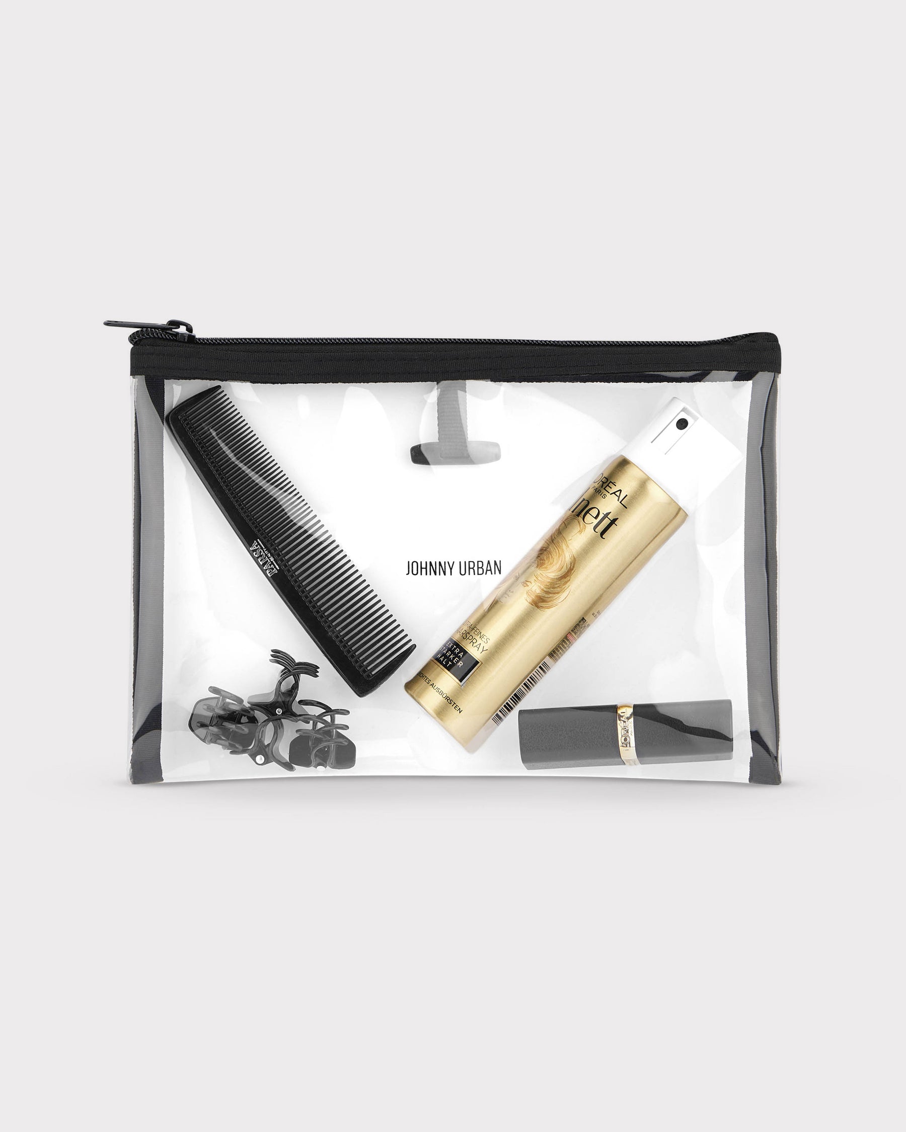 Transparente Kulturtasche 'Logan' von Johnny Urban mit schwarzem Reißverschluss, gefüllt mit Kamm, Haarklammern, Haarspray und Lippenstift