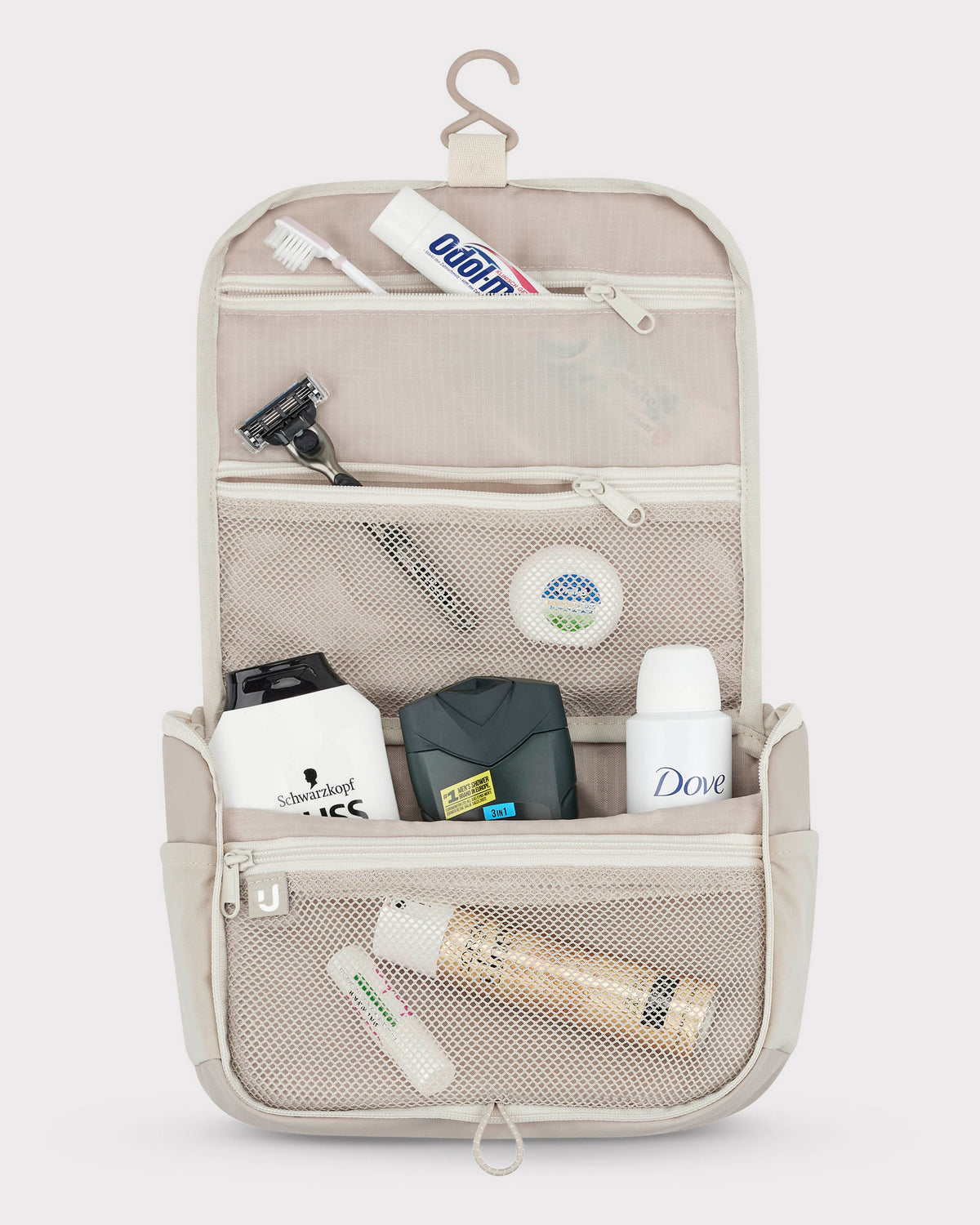Beige Kulturtasche 'Logan' mit transparenter Aufteilung, Zahnbürste, Zahnpasta, Rasierer und Pflegeprodukten