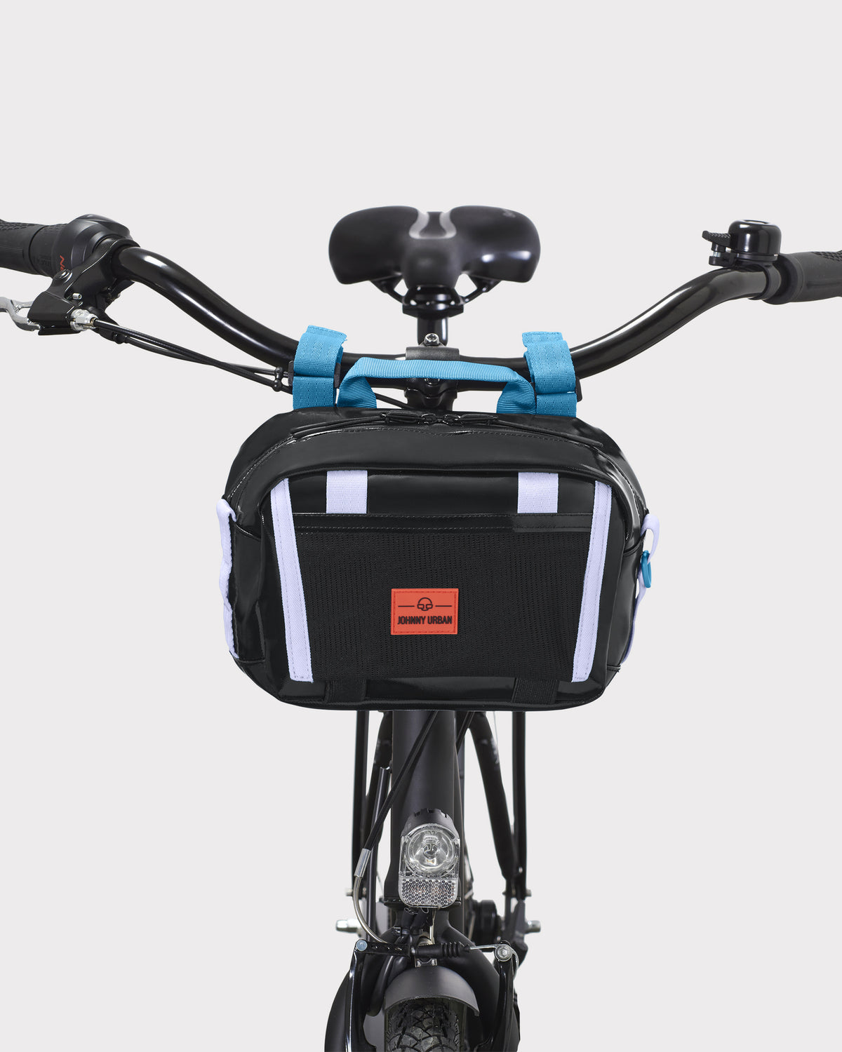 Lenkertasche Fahrrad 'Nelson' in Schwarz mit fliederfarbenen Befestigungsgurten an schwarzem Fahrradlenker befestigt
