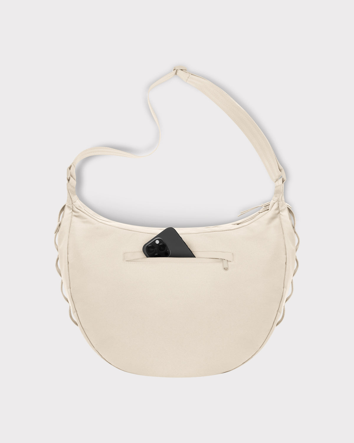 Beige halbmondförmige Tasche 'Ally XL' mit außenliegender Reißverschlusstasche und schwarzem Smartphone