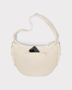 Beige halbmondförmige Tasche 'Ally XL' mit außenliegender Reißverschlusstasche und schwarzem Smartphone