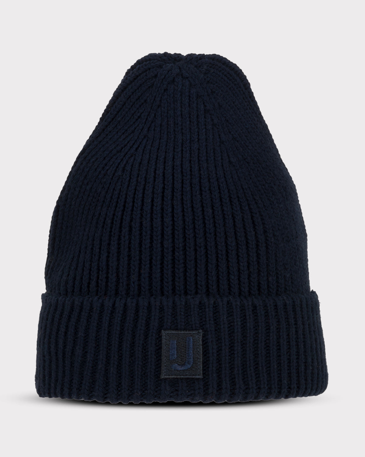 Dunkelblaue, gerippte Strickmütze 'Billie' von Johnny Urban mit Umschlag und kleinem Logo-Patch vorne