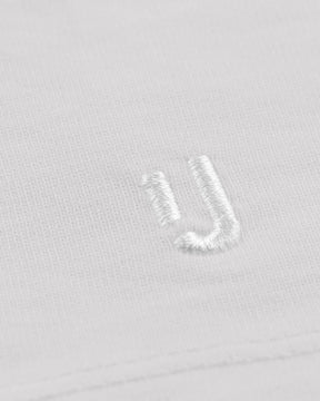 Weiße unisex Oversized-T-Shirt 'Sammy' von Johnny Urban mit weißem Sticklogo