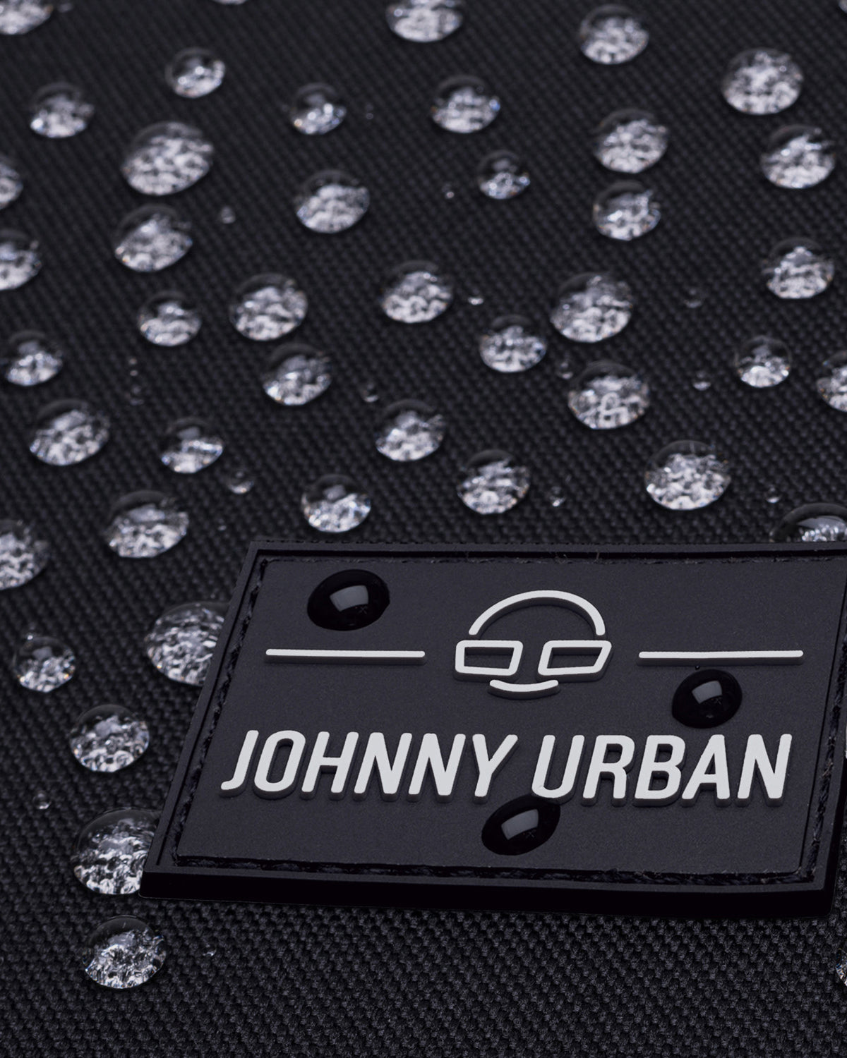 Wasserabweisendes Material mit Johnny Urban Logo auf Rolltop Rucksack 'Robin Medium' Fahrradrucksack