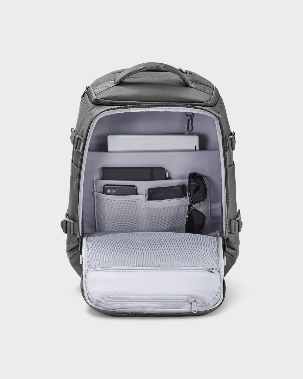 Rucksack 'Jack' von Johnny Urban in Grau mit vielen Fächern und Laptopfach, gefüllt mit Laptop, Tablet, Smartphone und Sonnenbrille