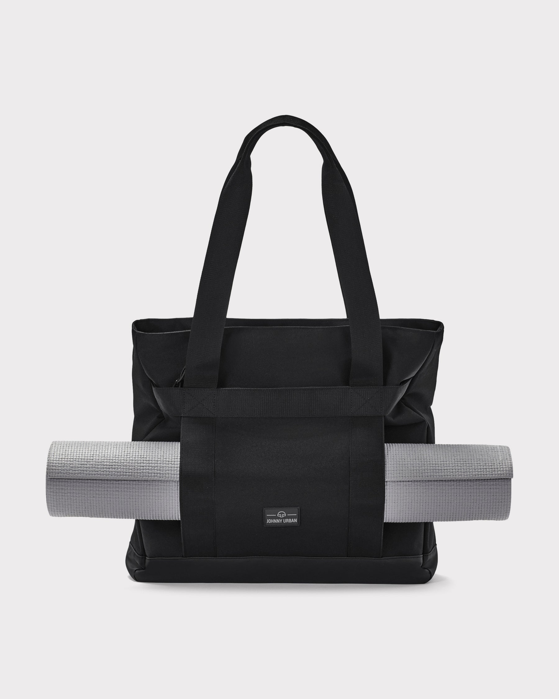 Schwarze Shopper-Tasche Kim von Johnny Urban mit dwóch langen Griffen und einer grauen Stoffrolle an der Außenseite