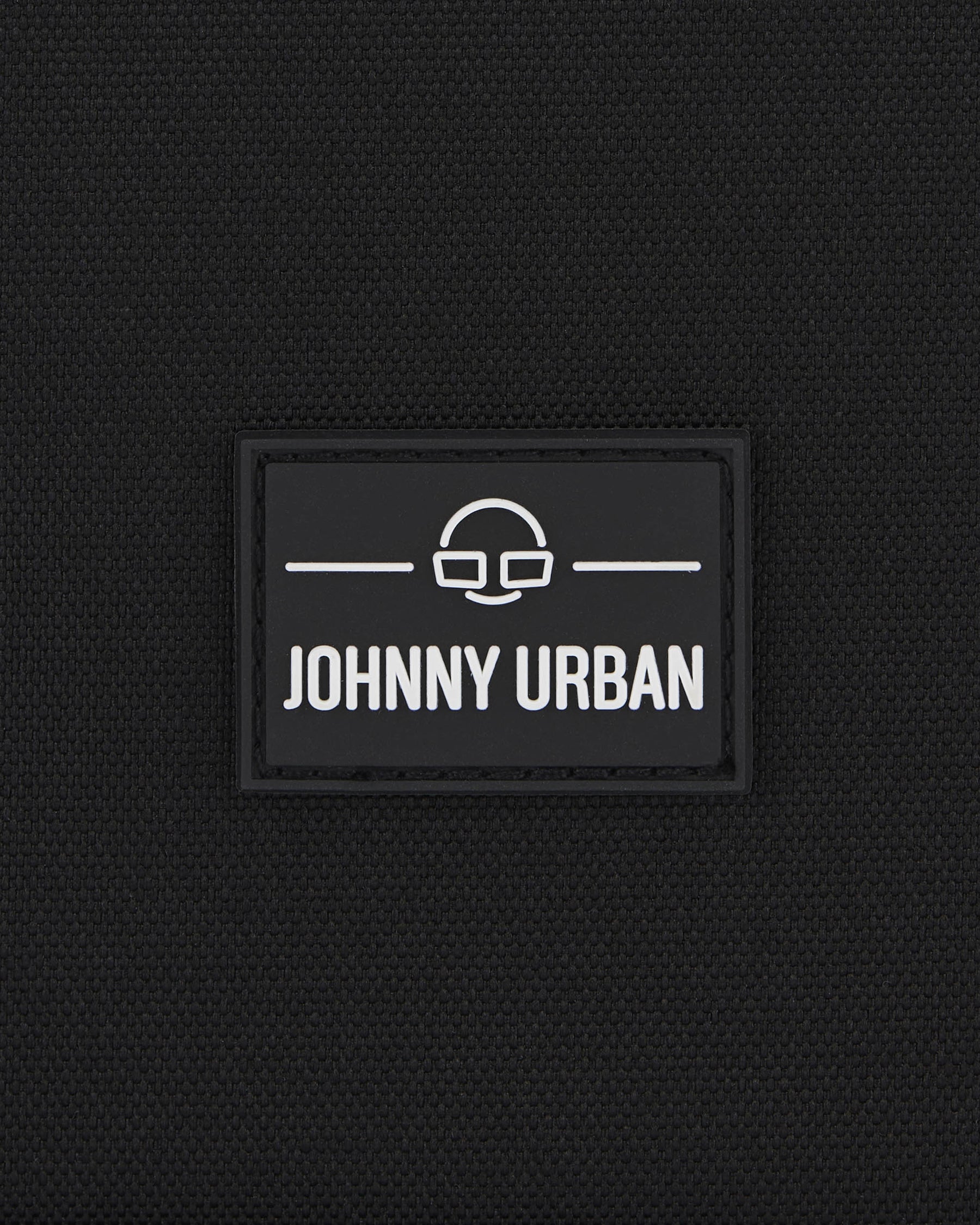 Johnny Urban Logo auf schwarzem nachhaltigem Tech Organizer Ted