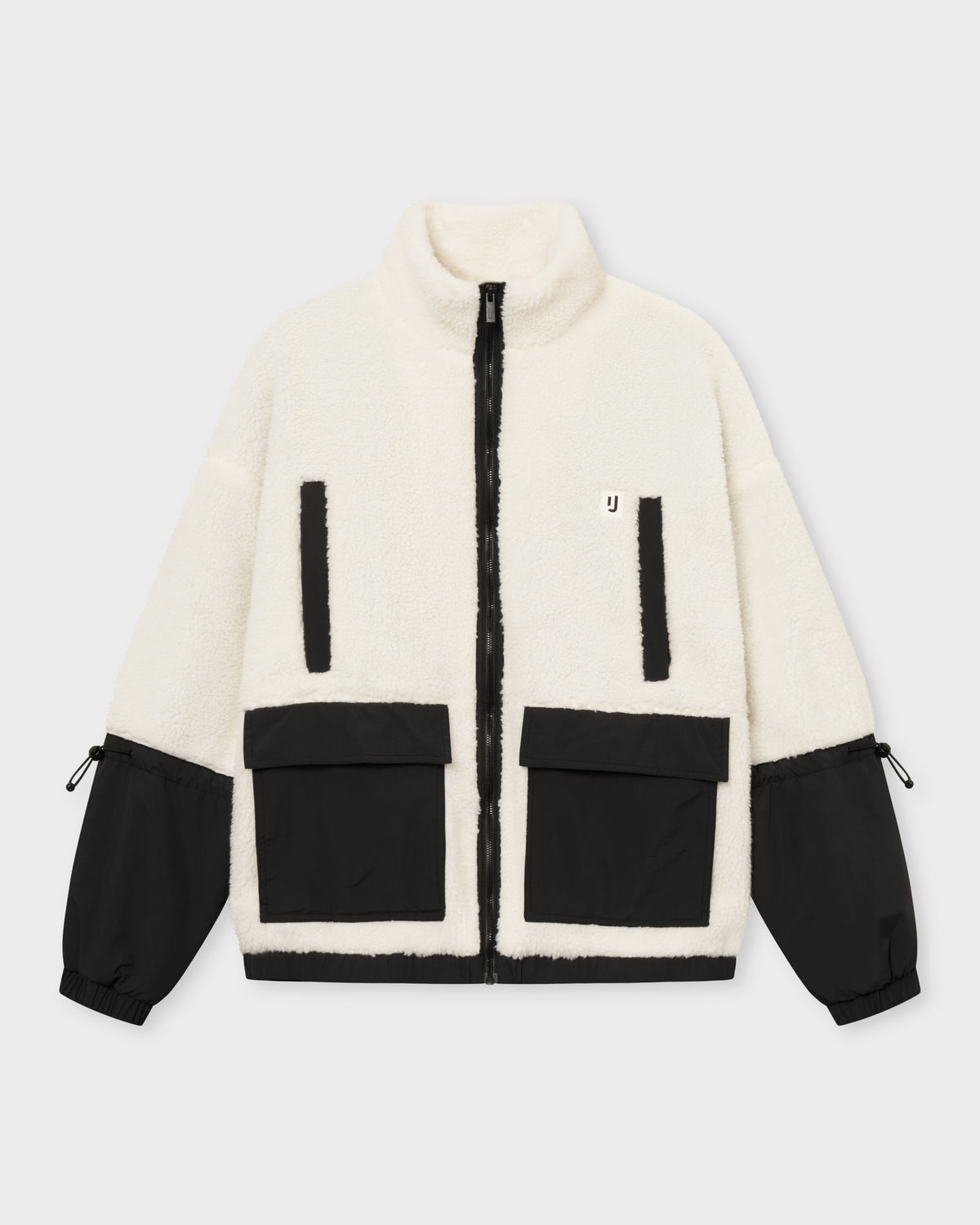 Teddy Fleecejacke 'Carson' in Creme mit schwarzen Taschen und Ärmeln, Reißverschluss vorne