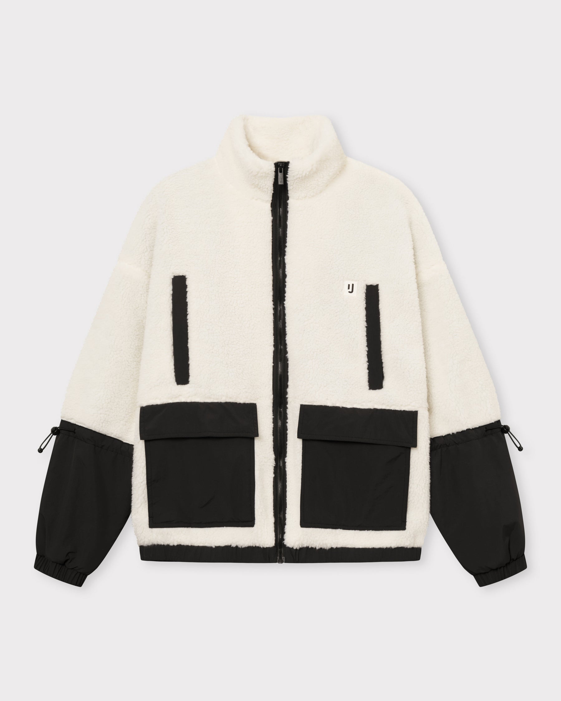 Teddy Fleecejacke 'Carson' in Creme mit schwarzen Taschen und Ärmeln, Reißverschluss vorne