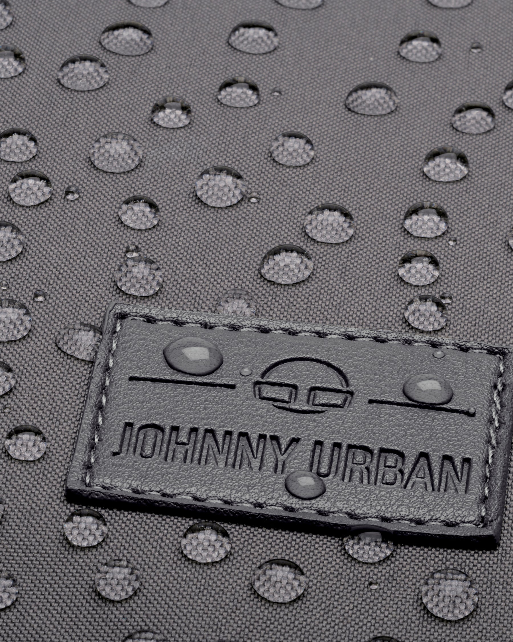 Wasserabweisendes graues Material des Business-Rucksacks 'Jasper' mit Johnny Urban Logo
