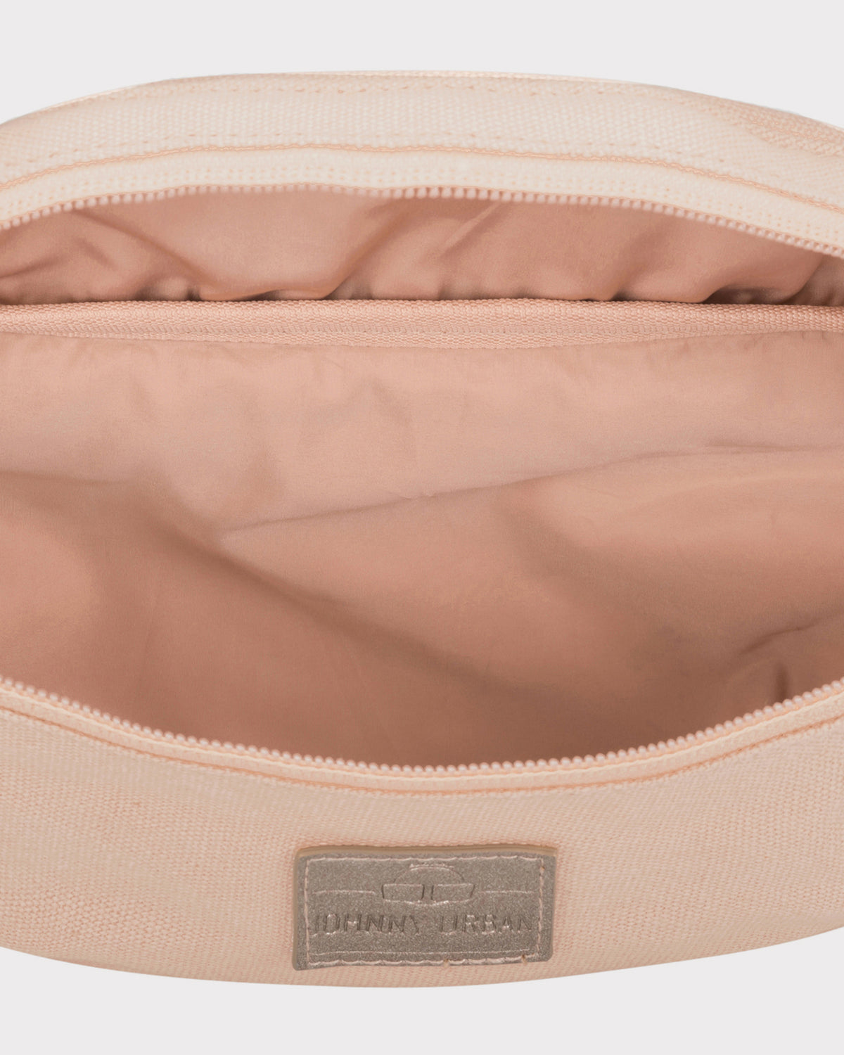 Innenansicht der rosa Canvas-Bauchtasche ‚Toni‘ von Johnny Urban mit Reißverschluss und Innentasche
