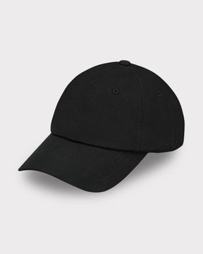 Schwarze Canvas-Cap 'Jen' mit gewölbtem Schirm und gesticktem Logo an der Seite