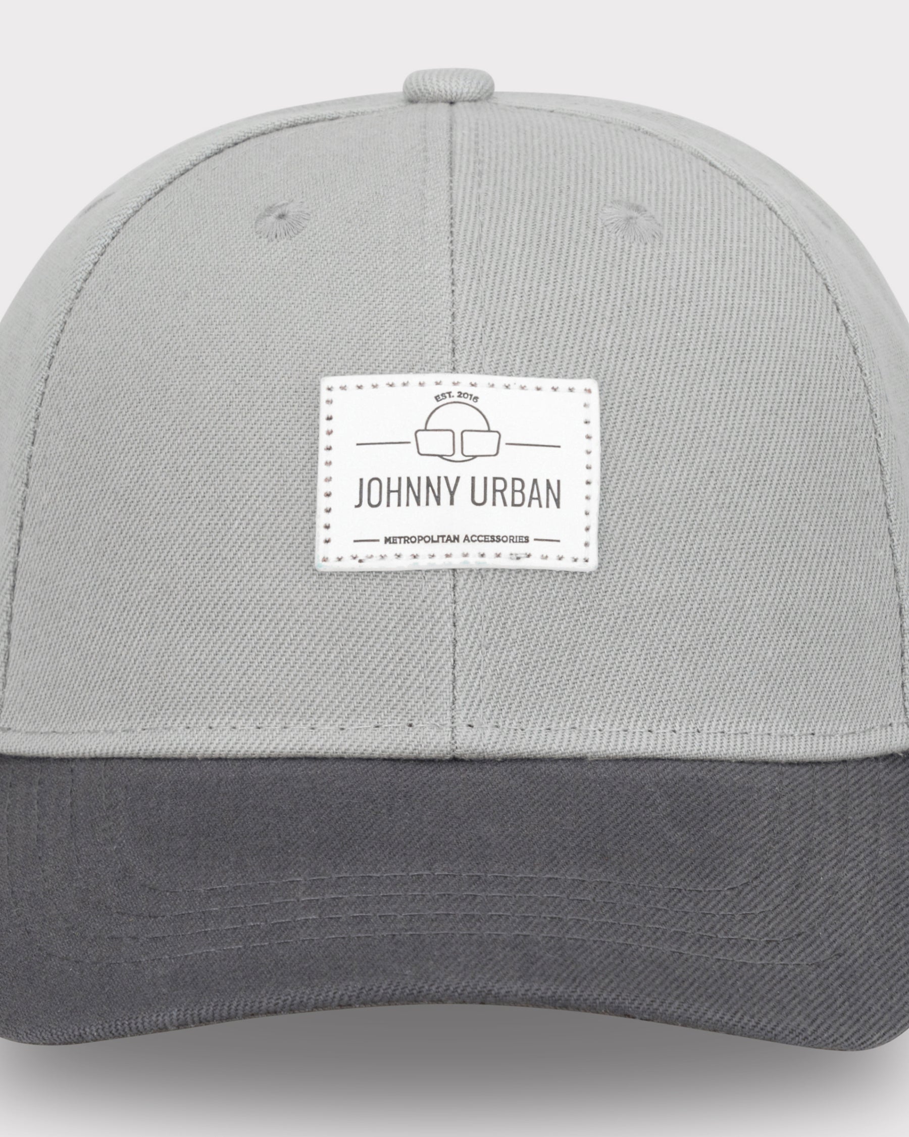 Cap 'Dean' von Johnny Urban in Grau mit gebogenem Schirm und Logo auf der Vorderseite