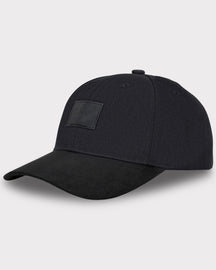 Schwarze Johnny Urban Cap 'Dean' mit gebogenem Schirm und Lederetikett vorne