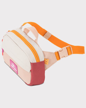 Kinder Bauchtasche 'Felix' von Johnny Urban in Rosa mit orangefarbenem Gurt und mehreren Farbstoffabschnitten