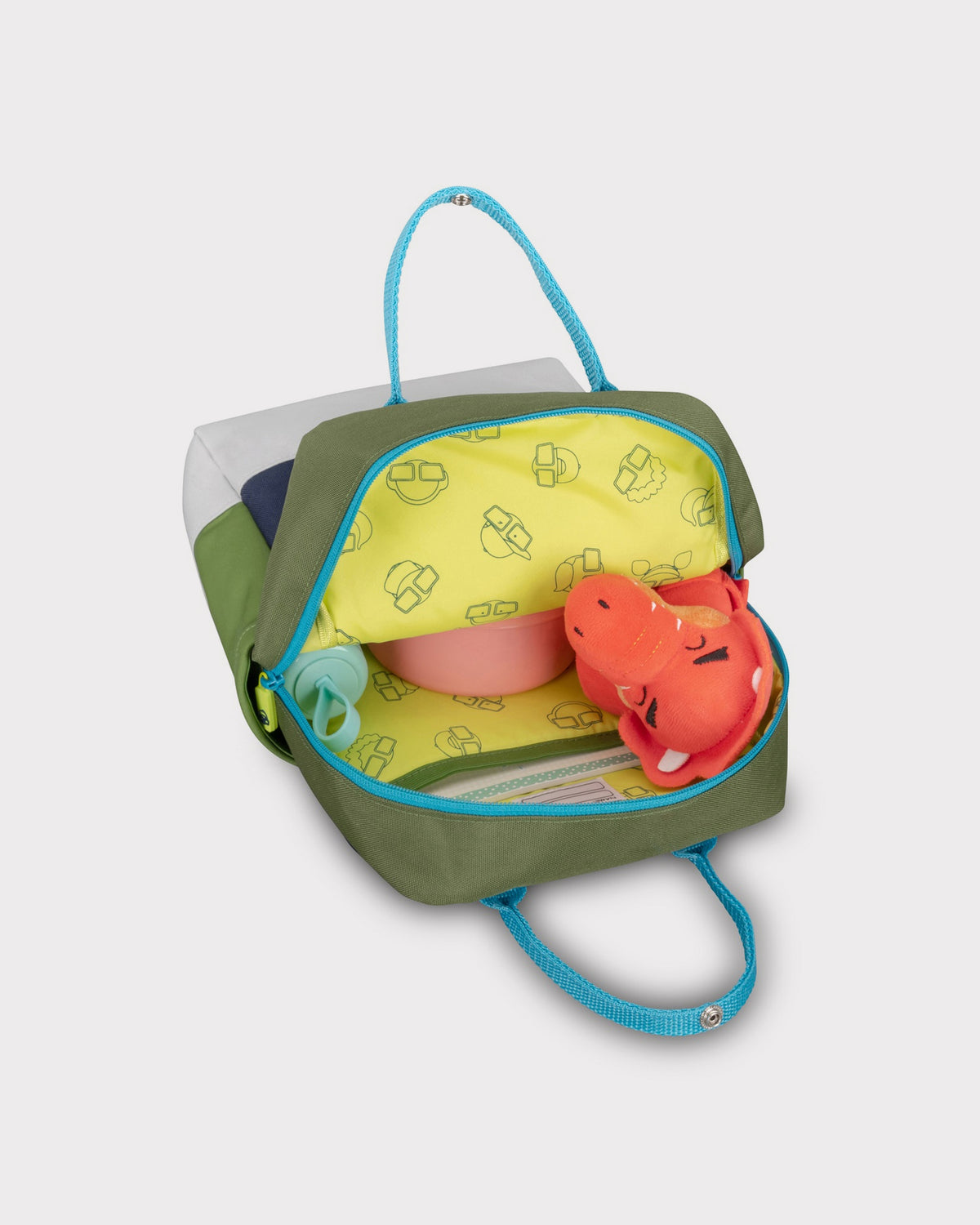 Kinderrucksack 'Linus' geöffnet mit rotem Stofftier, Trinkflasche und Brotdose innen