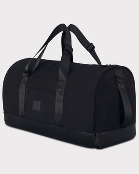 Schwarze Weekender-Reisetasche "Paul" von Johnny Urban mit zwei Tragegriffen und Schultergurt