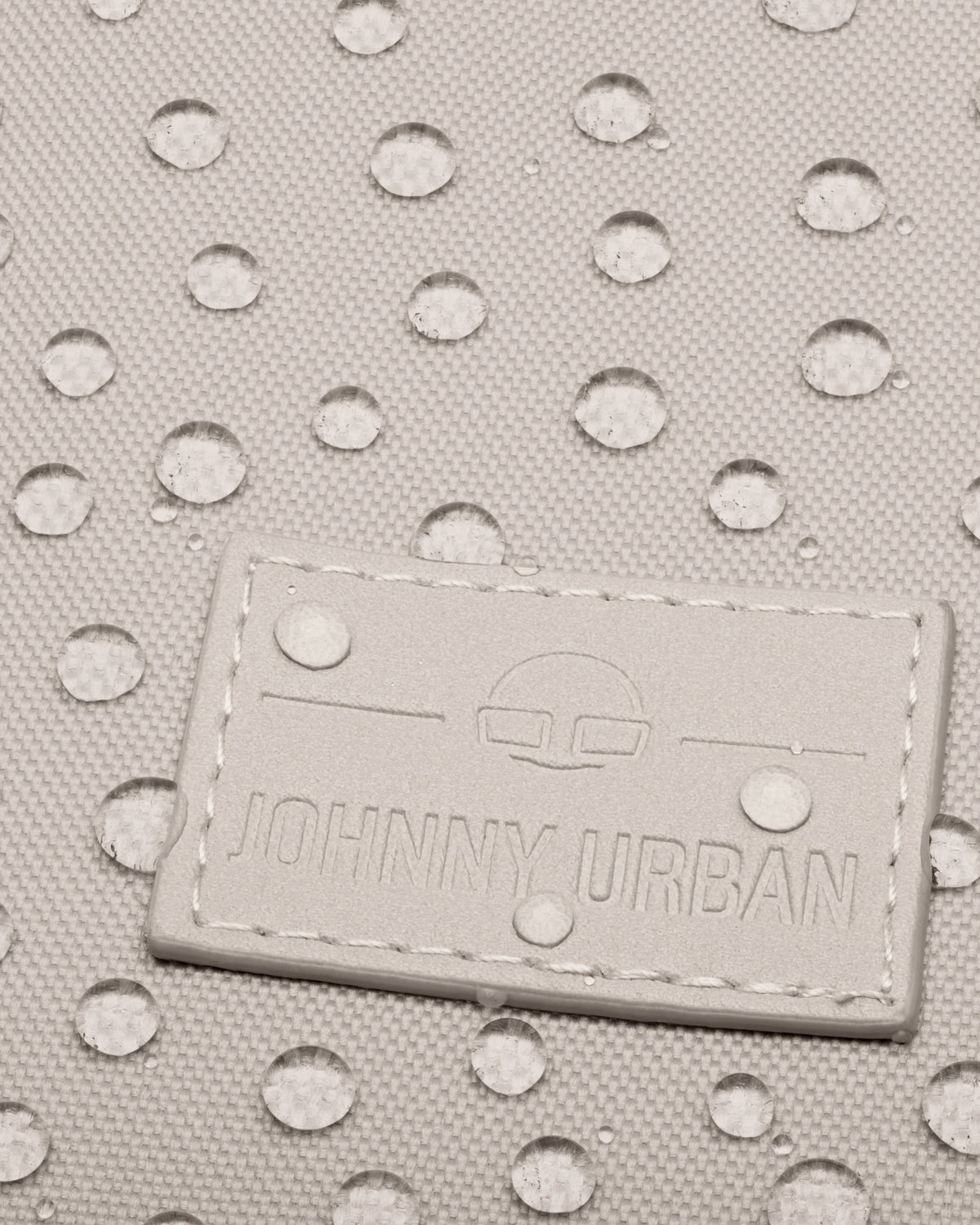 Beige wasserabweisendes Gewebe mit Johnny Urban Logo auf Rolltop Rucksack "Robin Small"
