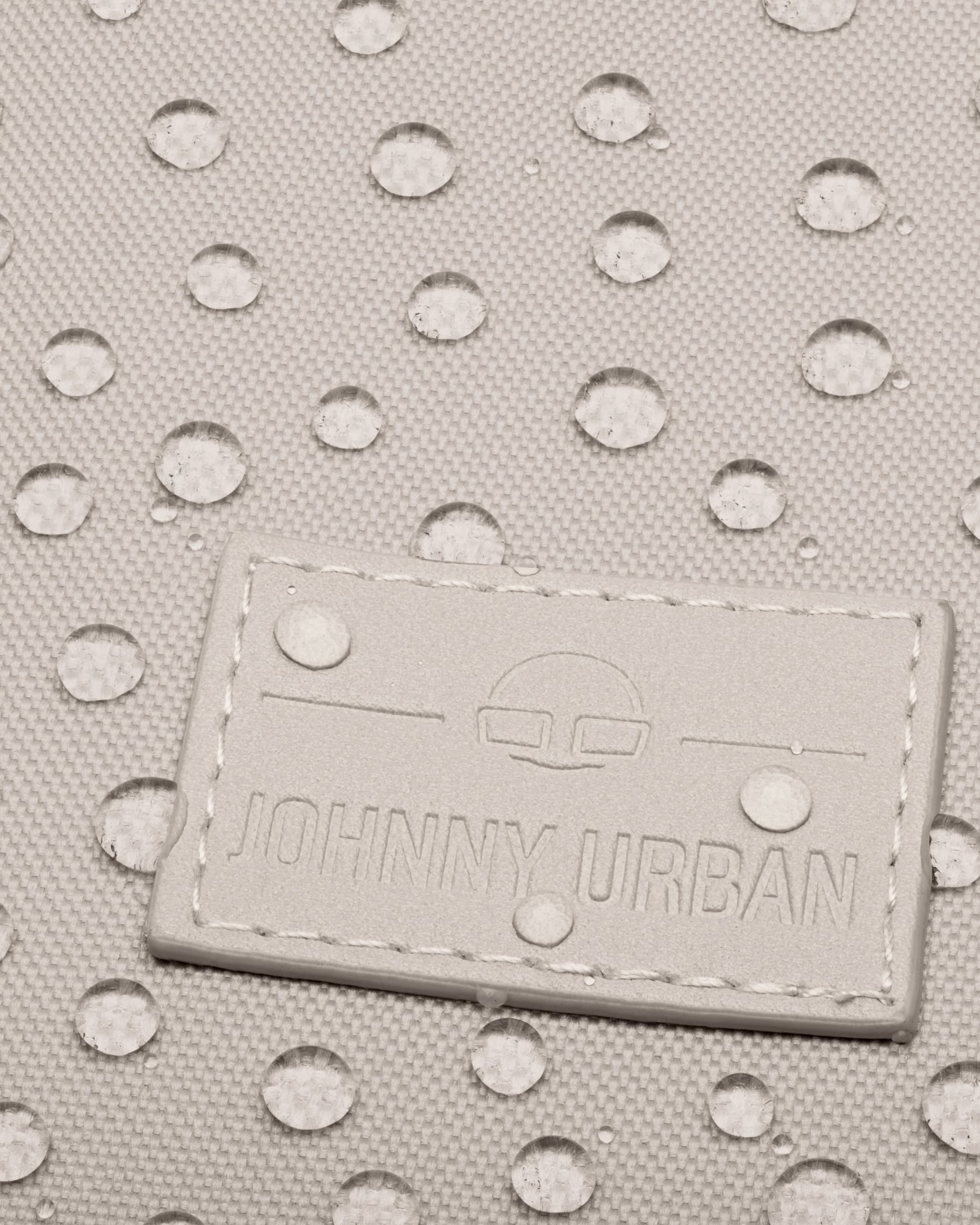 Beige wasserabweisendes Gewebe mit Johnny Urban Logo auf Rolltop Rucksack "Robin Small"